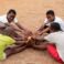 african-children-with-football-ball-sitting